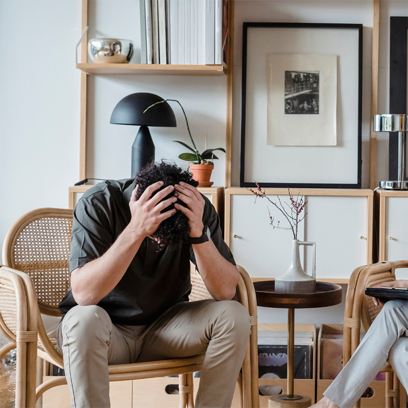 Christchurch Therapy | Pain Relief | Healthcare 5 man sitting with head in hands
